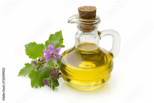 patchouli essential oil in the glass bottle, with fresh patchouli leaves, patchouli oil, aromatic oil, cosmetic product