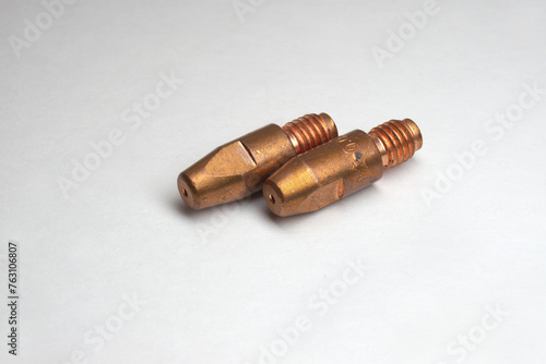 welding contact tips pair. MIG/MAG. Threaded tail, tapered, shaped