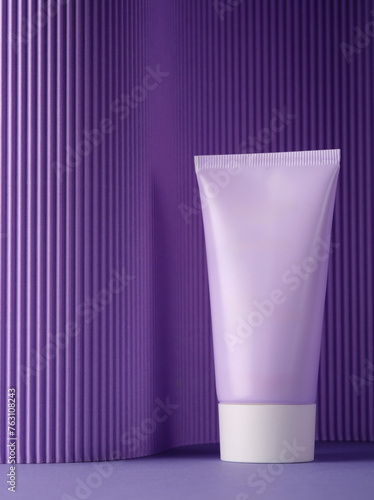  elegant lavender-colored cosmetic tube against a textured purple backdrop, highlighting the product’s simplicity and elegance