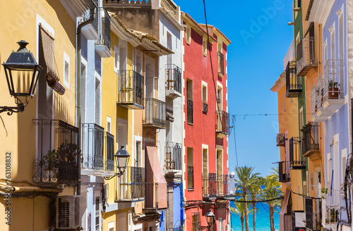 Colorful facades in a steep street in Villajoyosa, Spain