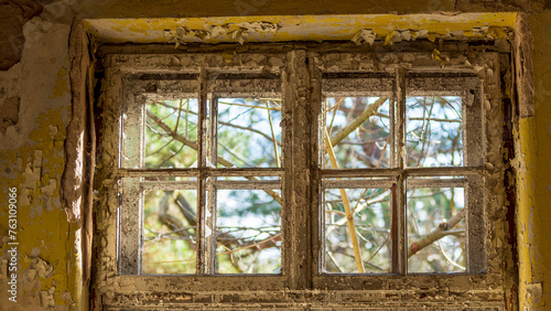 old window in abandoned building © Ola
