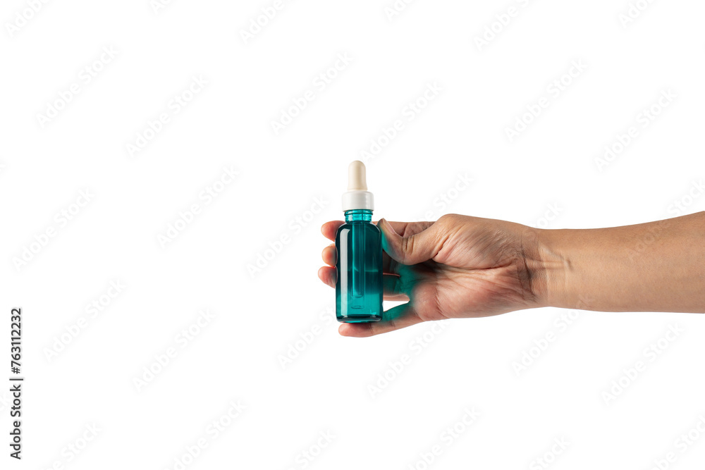 Blue glass cosmetic bottle, Skin care or sunscreen cosmetic with hand on transparent background. Blue glass cosmetic bottle, Skin care or sunscreen cosmetic with hand on transparent background.