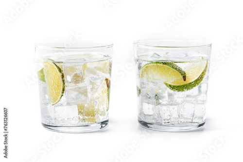 Glass of vodka tonic cocktail isolated on white background