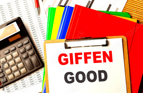 GIFFEN GOOD text on clipboard with calculator and color folder