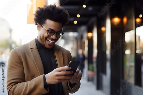 African american man in casual attire using smartphone in urban area