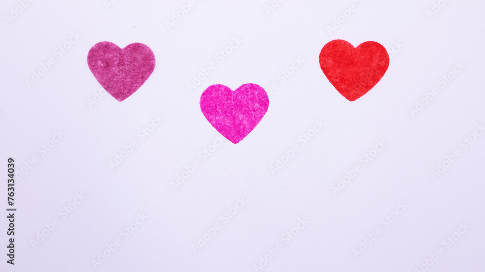 three hearts on white background