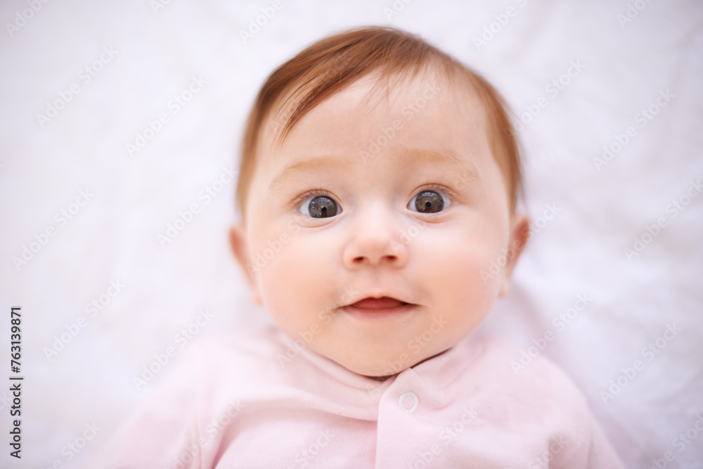 Happy, baby and portrait of girl on bed with smile for childhood, development and relax in nursery. Newborn, rest and face of kid with peace for growth, sweet infant and comfortable from above Happy, baby and portrait of girl on bed with smile for childhood, development and relax in nursery. Newborn, rest and face of kid with peace for growth, sweet infant and comfortable from above