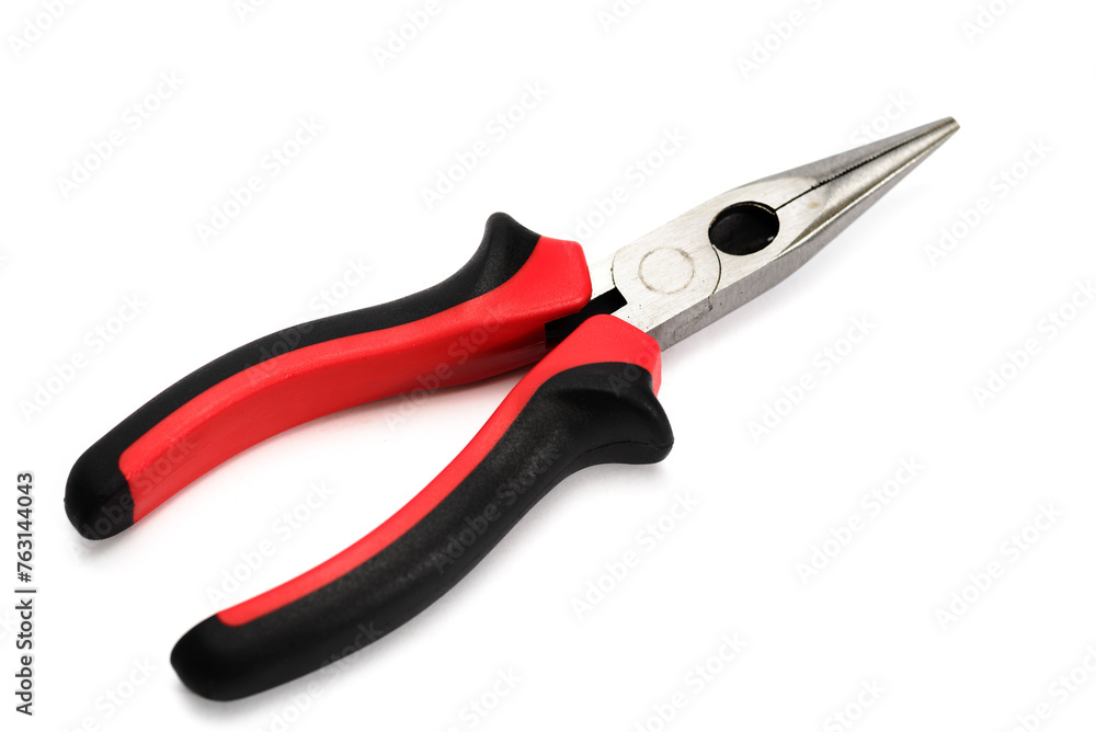 Long needle nose pliers with plastic handle on white background. Long needle nose pliers with plastic handle on white background.