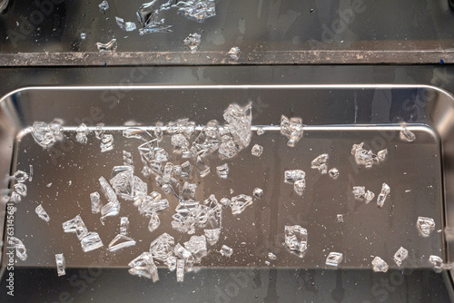 Broken Glass Pieces Shards in Dishwasher Machine Damage