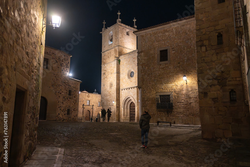 Illuminated old church in Caceres old town at night