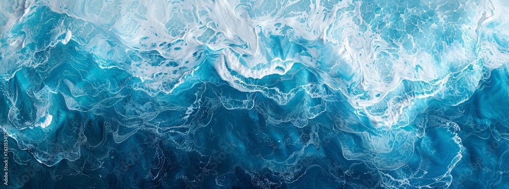 Aerial view of ocean waves, ocean texture in the style of blue and white colors, top down view. Panoramic view of the ocean with large waves Aerial view of ocean waves, ocean texture in the style of blue and white colors, top down view. Panoramic view of the ocean with large waves
