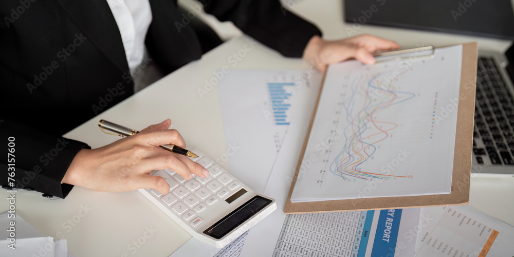 Documents, Business woman and accountant reading report for information, financial data or analysis. Paperwork, auditor check, review and bookkeeping, Calculate finance and tax in office Documents, Business woman and accountant reading report for information, financial data or analysis. Paperwork, auditor check, review and bookkeeping, Calculate finance and tax in office