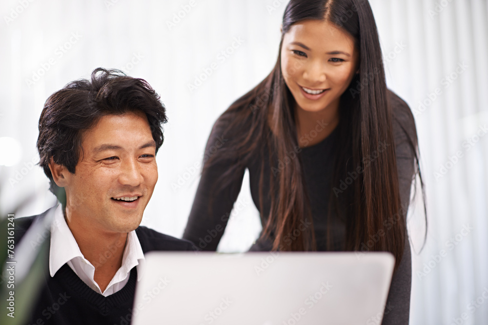 Happy, mentor and teamwork on laptop in office with businessman learning from support of woman. Feedback, advice or manager training asian man on computer in collaboration and reading online research Happy, mentor and teamwork on laptop in office with businessman learning from support of woman. Feedback, advice or manager training asian man on computer in collaboration and reading online research