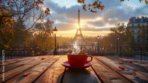 The Paris Eiffel Tower stands tall with its timeless architecture. The background was lit by the soft light of dawn. The morning scene captures the unique charm of Paris with a red coffee cup.