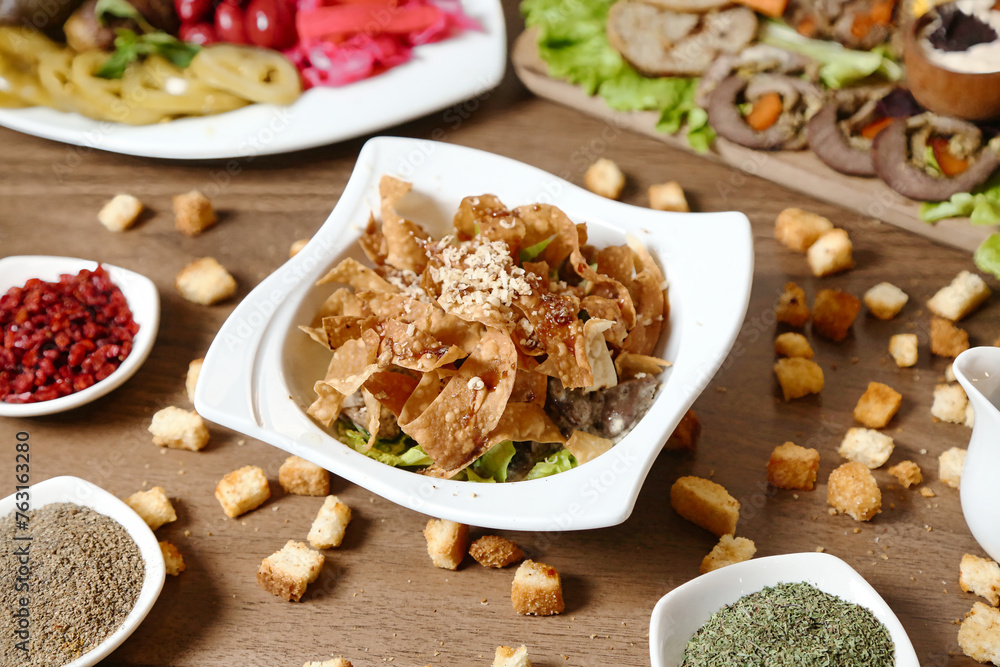 Wooden Table With Food-filled Bowls Wooden Table With Food-filled Bowls