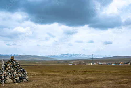 Ganjia Secret Land, Gannan Tibetan Autonomous Prefecture, Gansu Province-the grassland under the snow-capped mountains photo