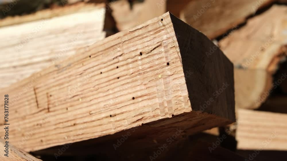 Extreme close up of firewood or small pieces of oak logs cut and prepared to be used in cast iron stove to heat house in cold days. Extreme close up of firewood or small pieces of oak logs cut and prepared to be used in cast iron stove to heat house in cold days.