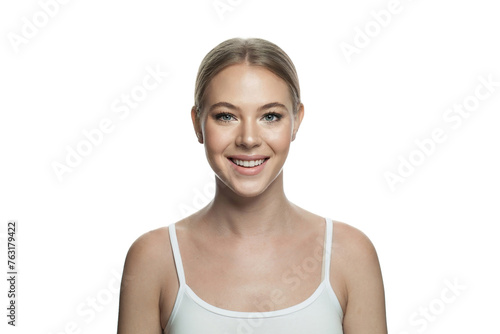 Attractive young woman with cute smile, healthy clear fresh skin and natural makeup isolated on white background. Skincare, facial treatment and cosmetology concept