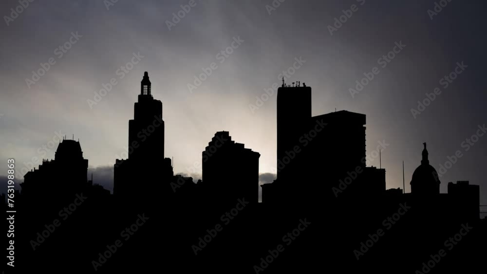 Skyline of Providence, Rhode Island, Time Lapse at Sunrise with Fast Clouds and Dark Silhouette of Skyscrapers Skyline of Providence, Rhode Island, Time Lapse at Sunrise with Fast Clouds and Dark Silhouette of Skyscrapers
