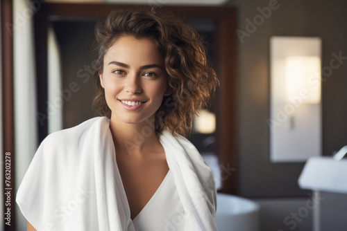 a young woman draped in a hotel towel, gracefully covering her body within the confines of her room, radiating beauty and relaxation. Free Download a young woman draped in a hotel towel, gracefully covering her body within the confines of her room, radiating beauty and relaxation. - GFXLoad