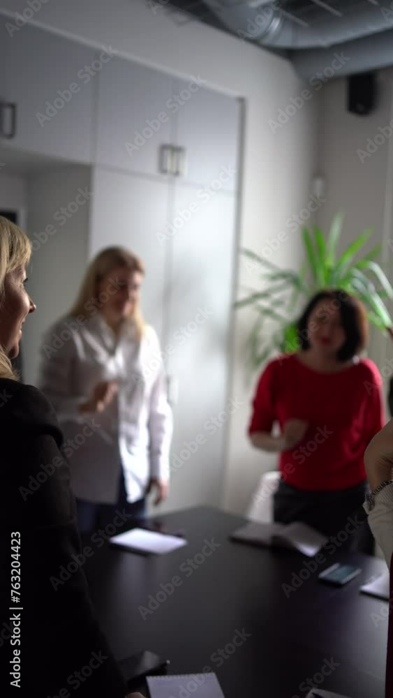 team members in the office congratulate each other on a good job and the completion of the project team members in the office congratulate each other on a good job and the completion of the project