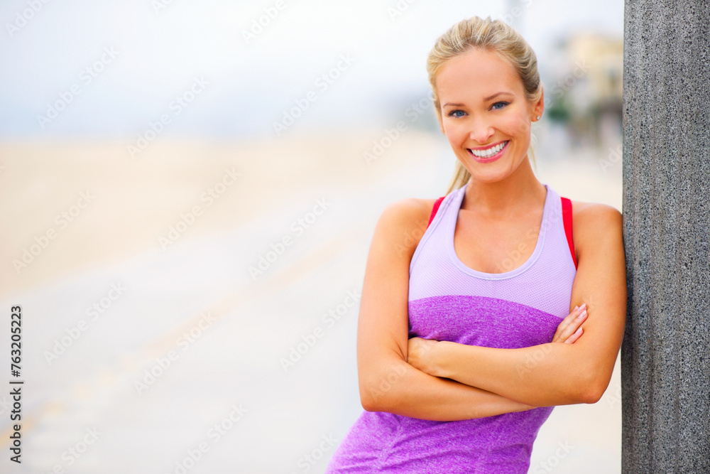 Outdoor, portrait or woman with arms crossed for running training, exercise mockup or workout in Greece. Confident lady, happy or sports athlete with smile ready for practice for wellness or fitness Outdoor, portrait or woman with arms crossed for running training, exercise mockup or workout in Greece. Confident lady, happy or sports athlete with smile ready for practice for wellness or fitness