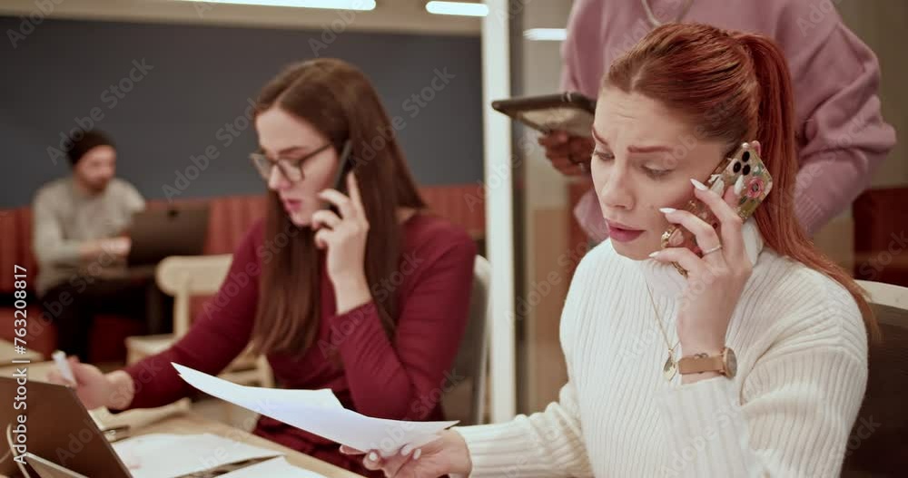 A business team working together on a project in a modern office space, showcasing their expertise and collaboration in a contemporary work setting. A business team working together on a project in a modern office space, showcasing their expertise and collaboration in a contemporary work setting.
