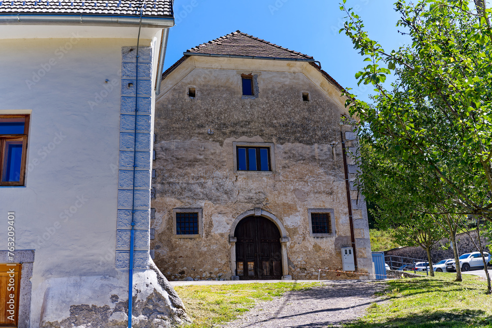 Scenic view of historic buildings at Predjama castle on a sunny summer day. Photo taken August 11th, 2023, Predjama, Slovenia. Scenic view of historic buildings at Predjama castle on a sunny summer day. Photo taken August 11th, 2023, Predjama, Slovenia.