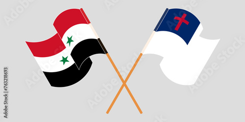 Crossed and waving flags of Syria and christianity