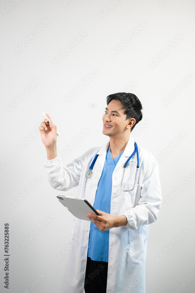 Man portrait of a doctor wearing a white coat and a stethoscope looking into the camera on a white isolated background Man portrait of a doctor wearing a white coat and a stethoscope looking into the camera on a white isolated background