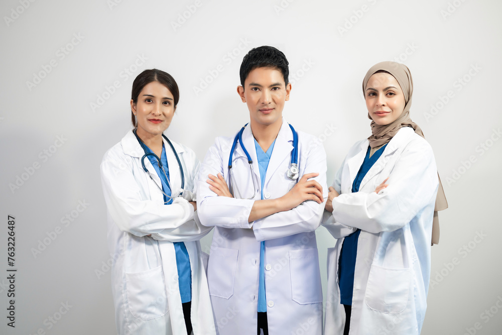 Successful team of medical doctors looking at camera and smiling while standin. Health, professional and people team. Successful team of medical doctors looking at camera and smiling while standin. Health, professional and people team.