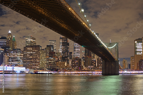 Night landscape of Manhattan and Brooklyn Bridge in winter. New York City, United States