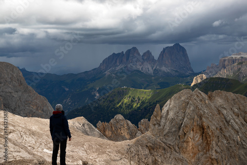 Mountain view with climber, Marmolada, mountain, Dolomites, Italy.