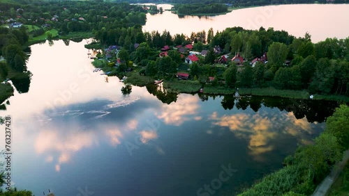 Aerial view of Lake Wulpinskie and Majdy Bay at sunset, famous landmark of Warmian-Masurian Province, Poland. photo
