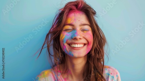 Smiling Woman With Colorful Paint on Face