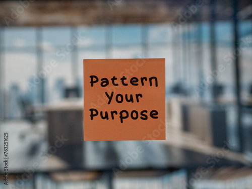 Post note on glass with 'Pattern Your Purpose'.