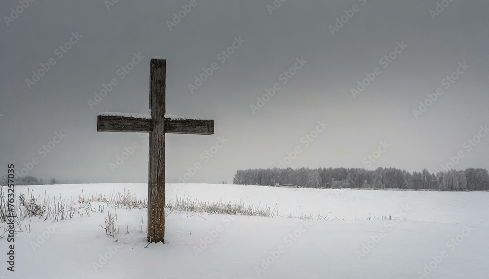 Wooden Cross in a Snowy Meadow in the Winter Wooden Cross in a Snowy Meadow in the Winter