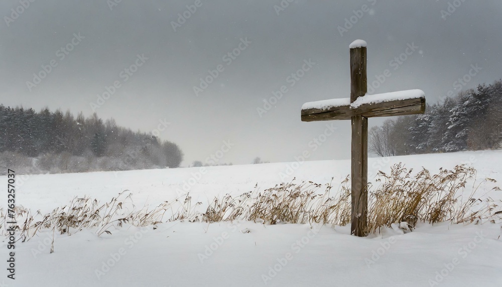 Wooden Cross in a Snowy Meadow in the Winter Wooden Cross in a Snowy Meadow in the Winter