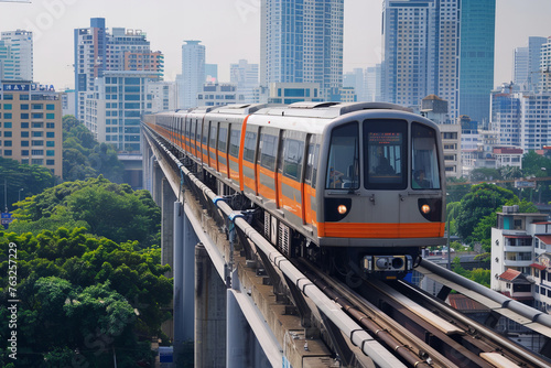 Urban Transit Efficiency: Elevated Train Gliding Through a Modern City Banner