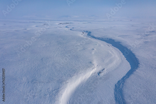 Aerial view of frozen river in Vorkuta, Komi Republic, Russia. photo