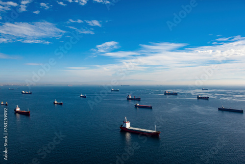 Aerial view of cargo ships anchored in the Marmara Sea waiting to enter the Bosphorus, Istanbul, Turkey.