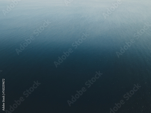 Aerial view of the blue shades of the sea in San Vito Lo Capo, Sicily, Italy.