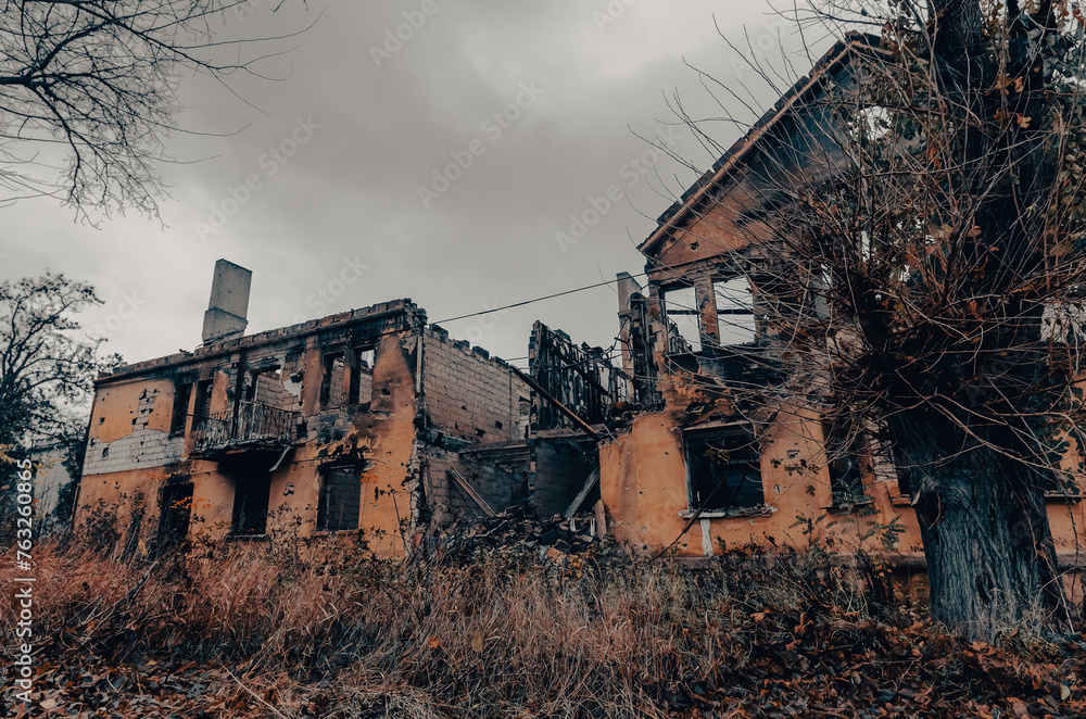 destroyed and burned houses in the city during the war in Ukraine