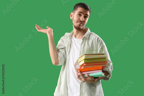 Confused young man with sta...