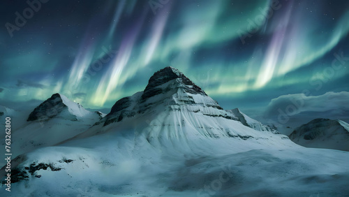 Amazing view of green aurora borealis shining in night sky over snowy mountain ridge