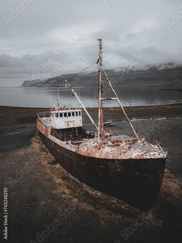 Aerial view of the Gardar BA 64 shipwreck laying on the Patreksfjordur fjord shoreline, Westfjords, Iceland. photo