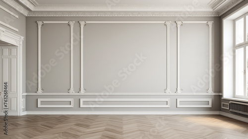 A large, empty room with white walls and a wooden floor. The room is very spacious and has a clean, minimalist look photo