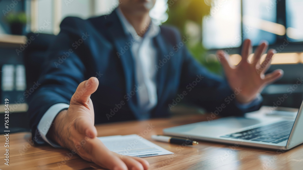 Firm Refusal: Closeup of Businessman's Stop Gesture
Firm Refusal: Closeup of Businessman's Stop Gesture