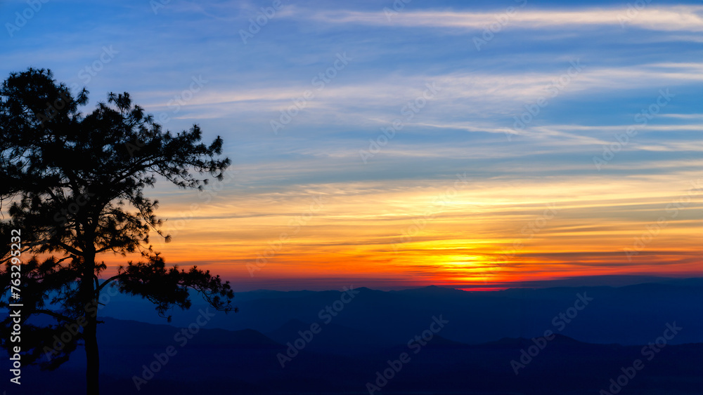 Sunset at peak mountain landscape