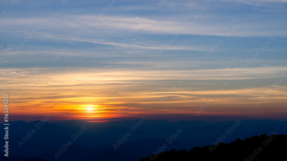 Sunset at peak mountain landscape